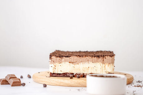 Grain-Free cookies & cream cheesecake (layers of brownie, plain cheesecake, chocolate cheesecake, and cookie crumbs)