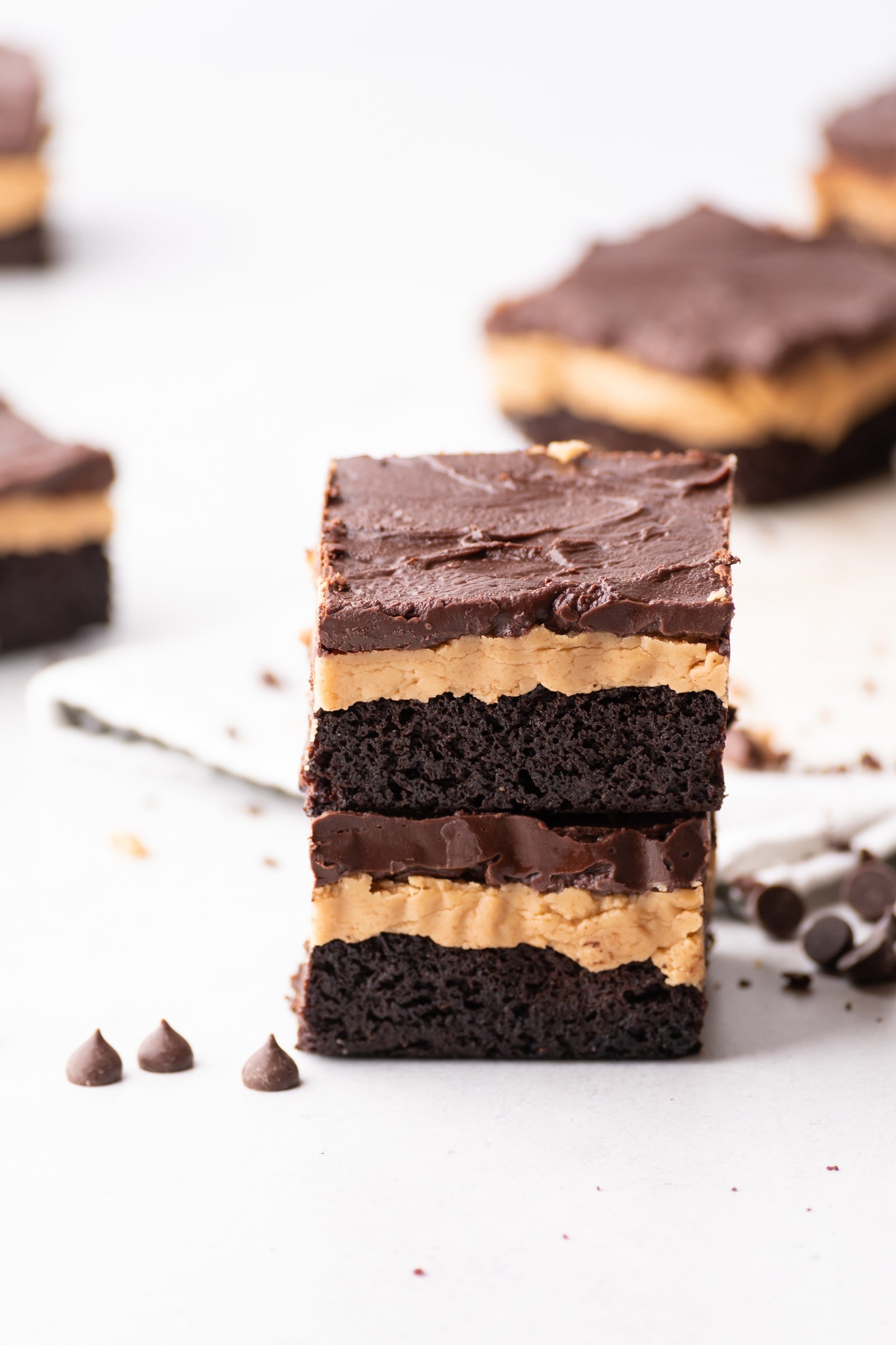 Brownies with peanut butter filling and chocolate ganache