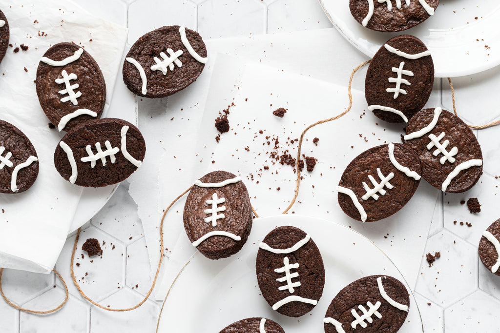 Football Brownies on plates and counter with string
