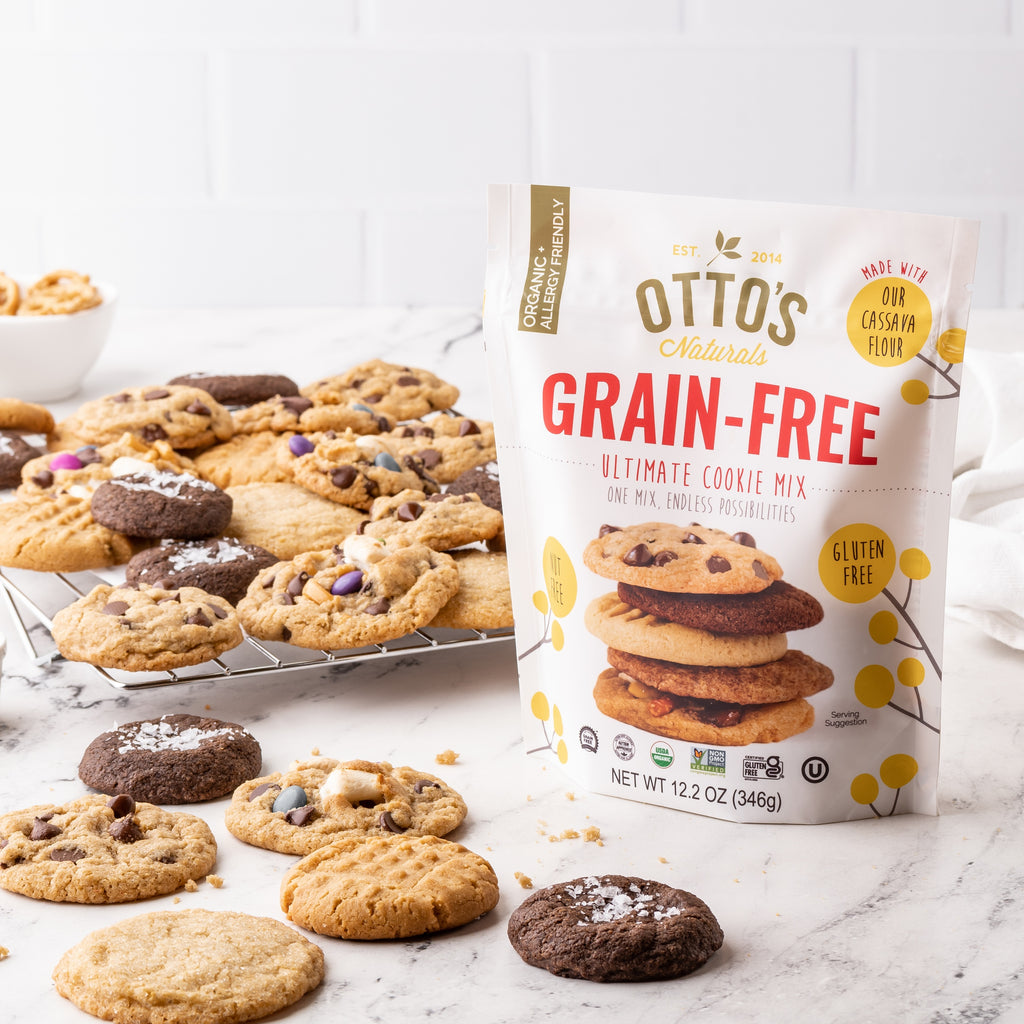 Otto's Naturals cassava flour grain-free cookie mix, surrounded by several different kinds of baked cookies